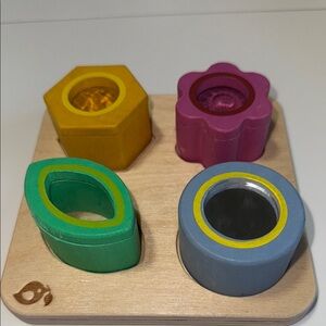 Yellow and Pink Wooden Puzzle Game